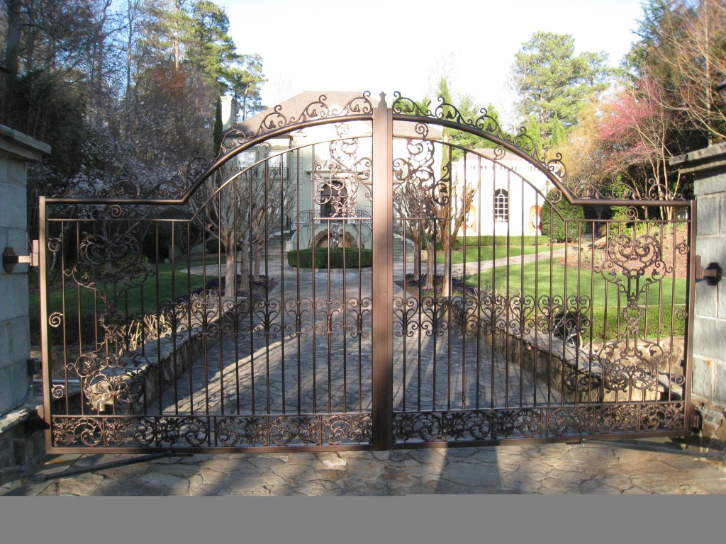 Ornate custom Atlanta driveway gate with copper patina