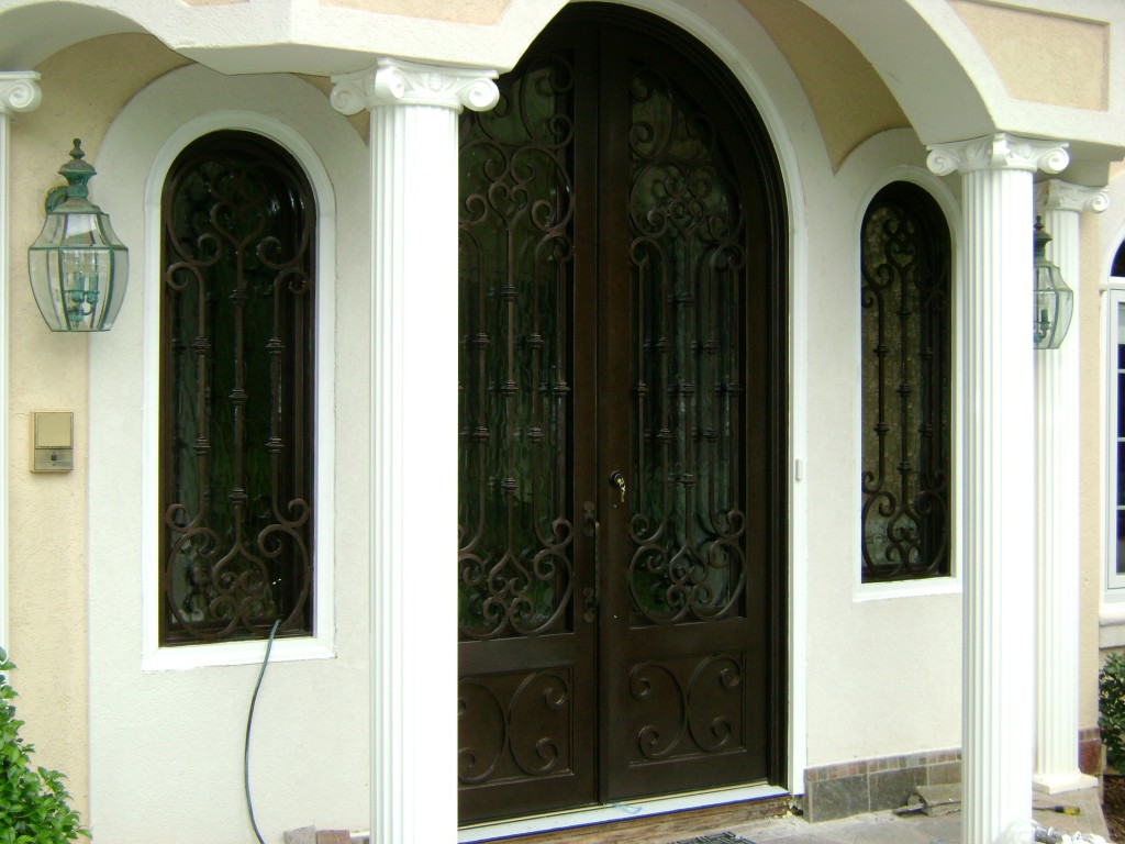 Beautiful Atlanta arched door with matching arched windows