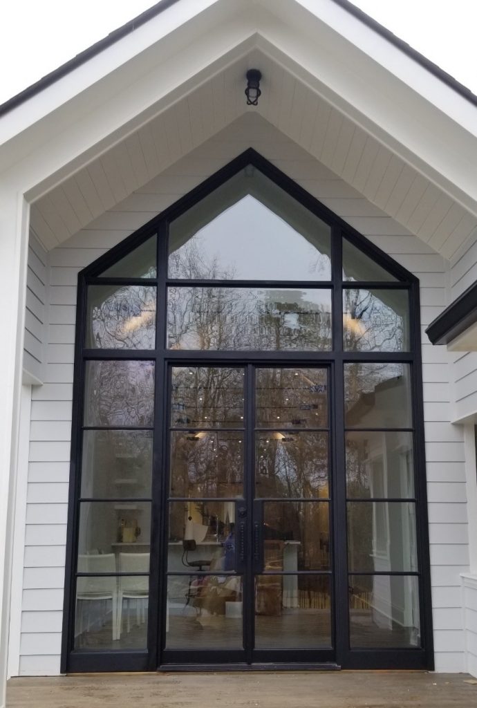 Modern A-frame style iron door created and installed in Atlanta