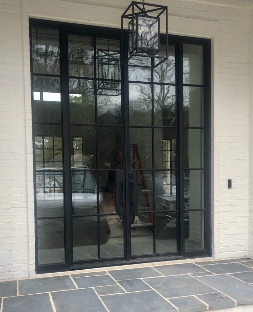 Modern square door in Atlanta, GA with thin iron pieces creating a sleek look