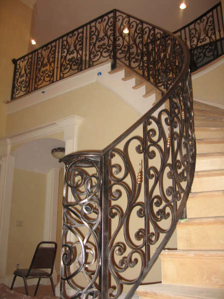 A very ornate railing in this Atlanta home's open floorplan