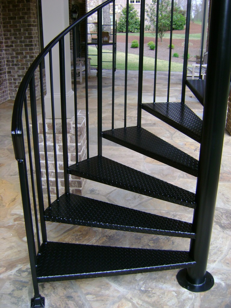 A simple black custom Atlanta iron spiral staircase